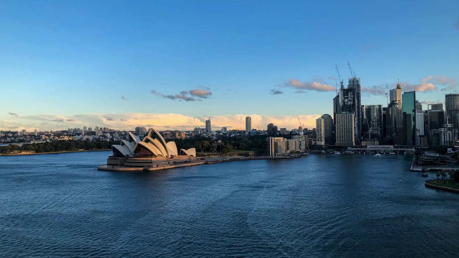 Sydney Opera House, Circular Quay and The Rocks viewed across Sydney Harbour